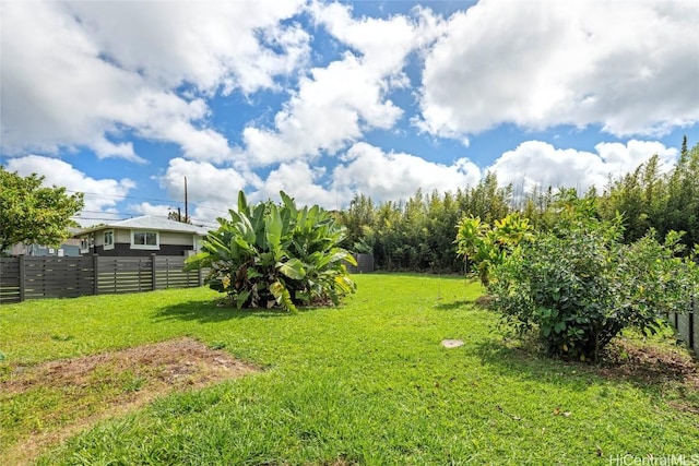 view of yard featuring fence