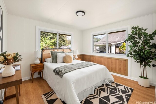 bedroom featuring light wood finished floors