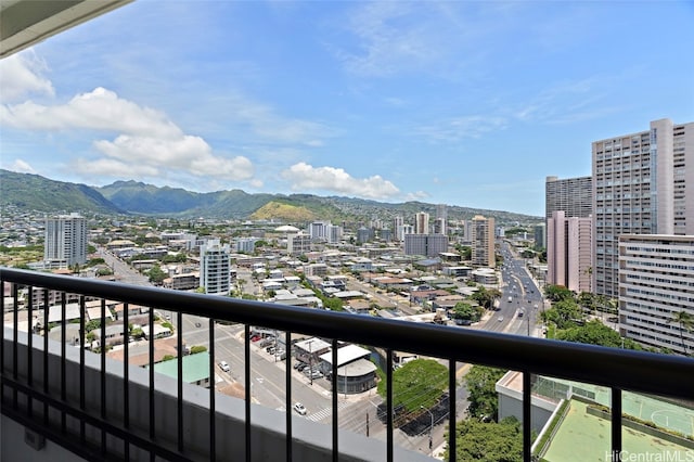 balcony featuring a mountain view