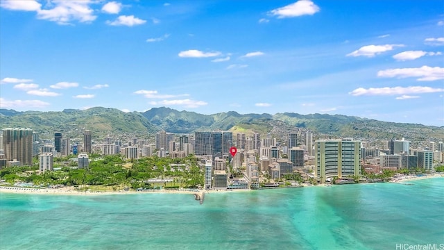 exterior space with a mountain view and a beach view