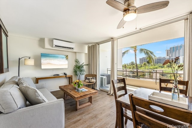 interior space featuring ceiling fan and an AC wall unit