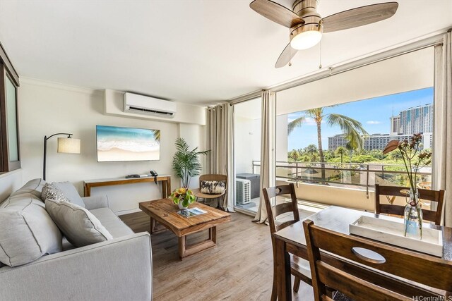 sunroom / solarium with a city view and a wall unit AC