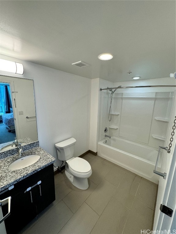 full bathroom with vanity, toilet, tile patterned floors, and shower / bathtub combination