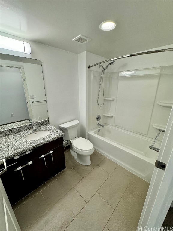 full bathroom with  shower combination, vanity, toilet, and tile patterned floors