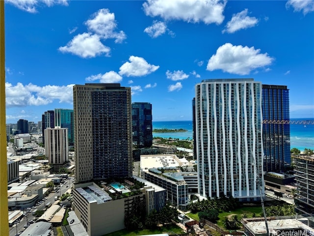 property's view of city with a water view