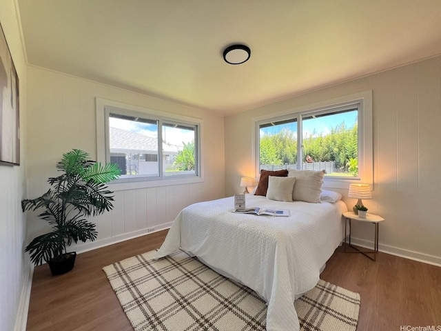 2315 California Ave Unit B, Wahiawa, HI 96786 - bedroom featuring baseboards, multiple windows, and wood finished floors