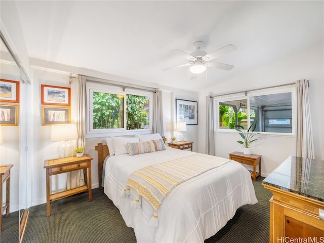 carpeted bedroom featuring ceiling fan