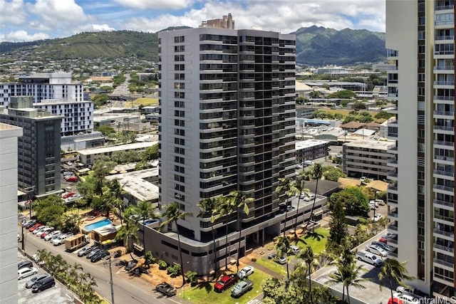 view of building exterior featuring a mountain view