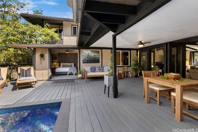 wooden deck with ceiling fan