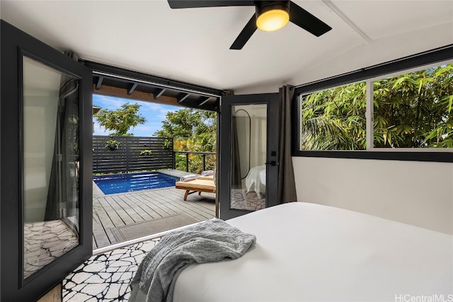 bedroom featuring lofted ceiling and ceiling fan