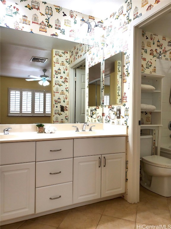 bathroom featuring vanity, ceiling fan, toilet, and tile patterned flooring