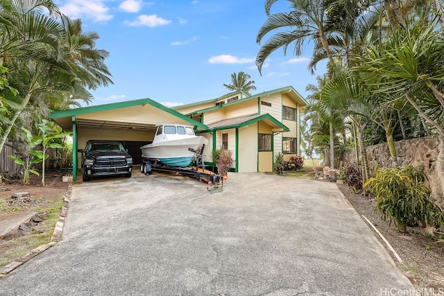 view of front facade featuring a carport