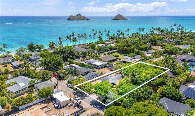 aerial view featuring a residential view and a water view