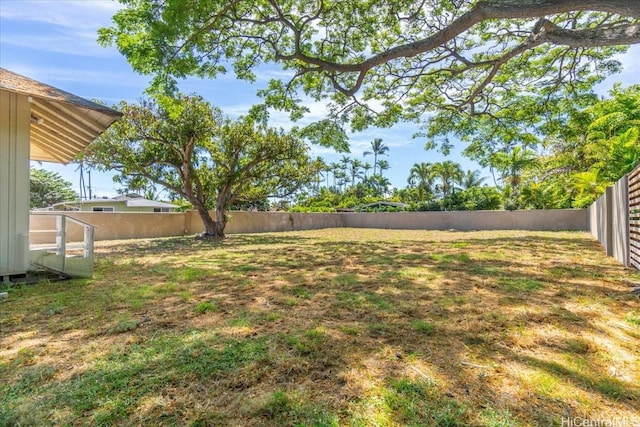 view of yard featuring a fenced backyard