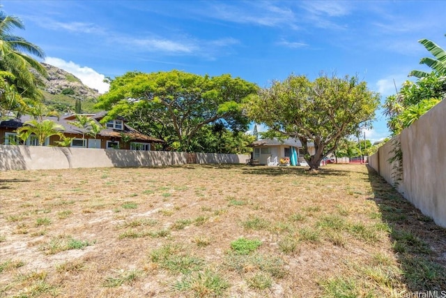 view of yard with a fenced backyard