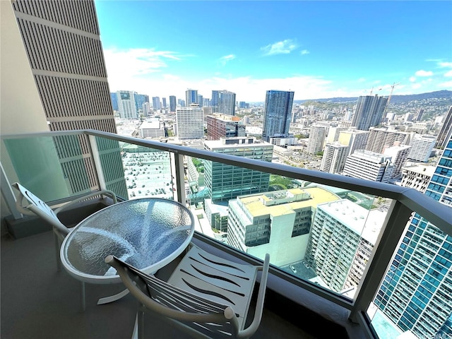 balcony featuring a view of city