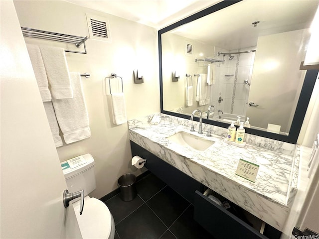 bathroom with toilet, visible vents, a shower, and vanity