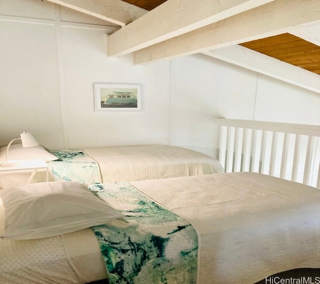 bedroom featuring beam ceiling