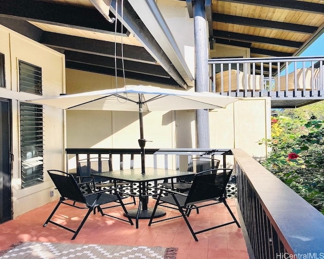 balcony featuring outdoor dining space