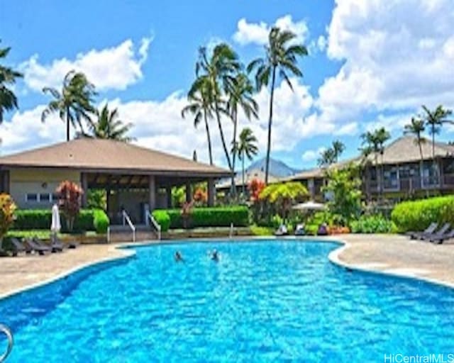 view of swimming pool with a patio area