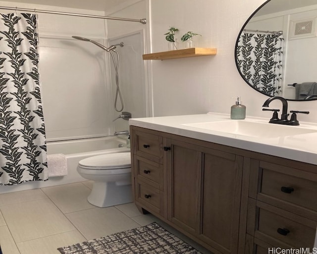 full bathroom with tile patterned flooring, shower / tub combo, vanity, and toilet