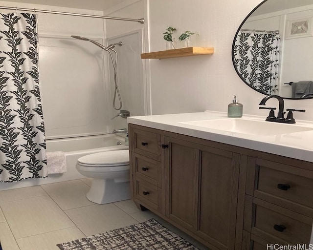 bathroom featuring vanity, toilet, shower / bath combo, and tile patterned floors