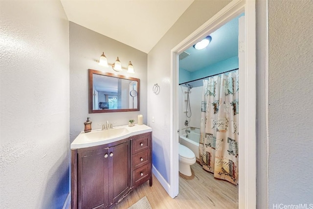 full bathroom featuring shower / bath combination with curtain, vanity, toilet, and hardwood / wood-style flooring