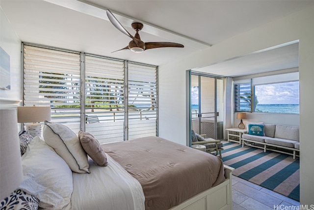 bedroom featuring access to outside and ceiling fan