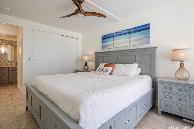 bedroom with ceiling fan and light tile patterned floors