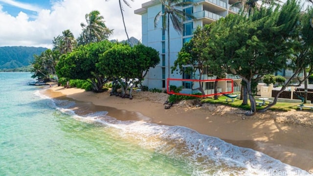 view of home's community with a view of the beach and a water view