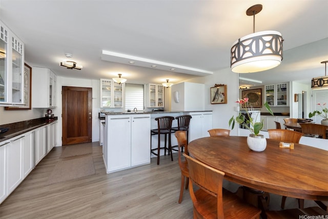 2895 Kalakaua Ave Unit 505, Honolulu, HI 96815 - dining room featuring light wood-type flooring