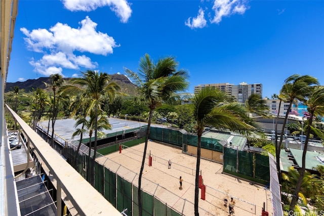 exterior space with volleyball court and a mountain view