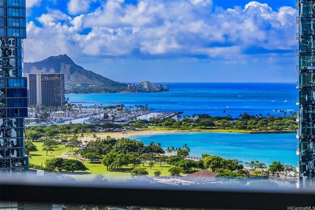 1000 Auahi St Unit 2506, Honolulu, HI 96814 - water view with nearby urban area and a mountain backdrop