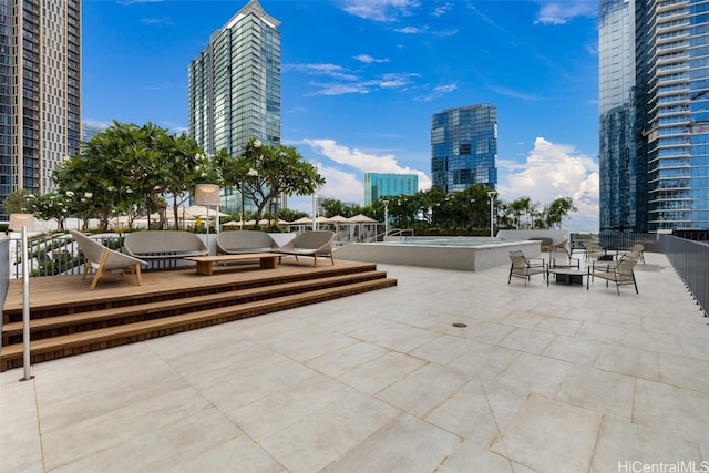 surrounding community featuring a patio area