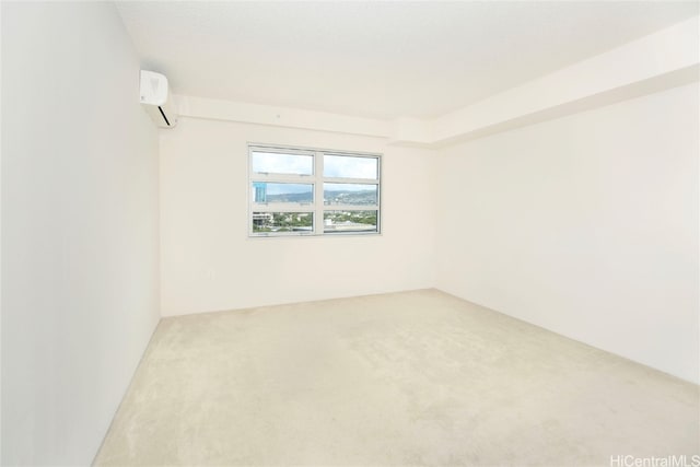 carpeted empty room with a wall unit AC