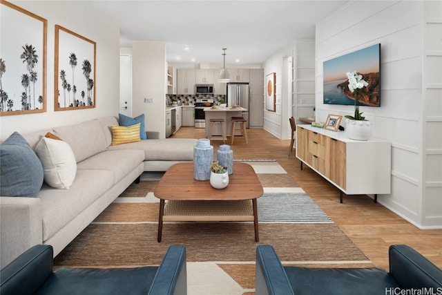 living room with light hardwood / wood-style floors