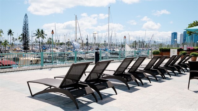 view of patio featuring a water view