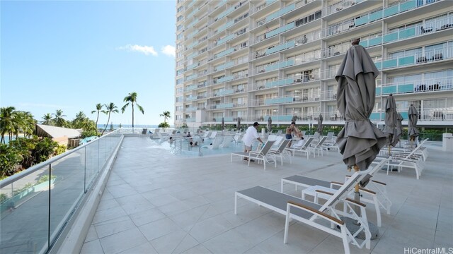 view of patio with a balcony