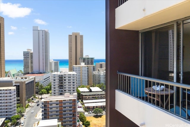 balcony featuring a water view