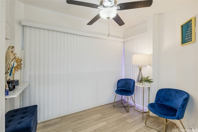 sitting room with light hardwood / wood-style flooring