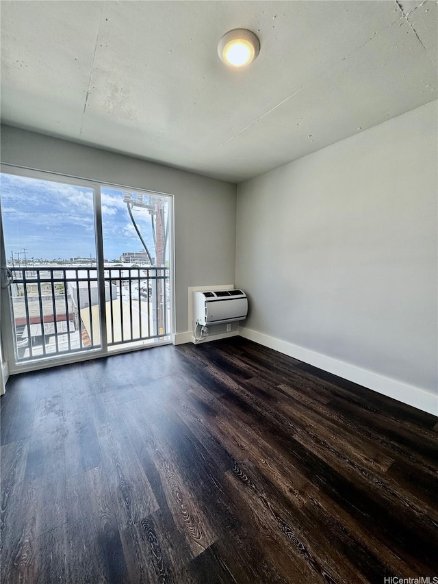 803 Waimanu St Unit 426, Honolulu, HI 96813 - unfurnished room with wood finished floors and baseboards