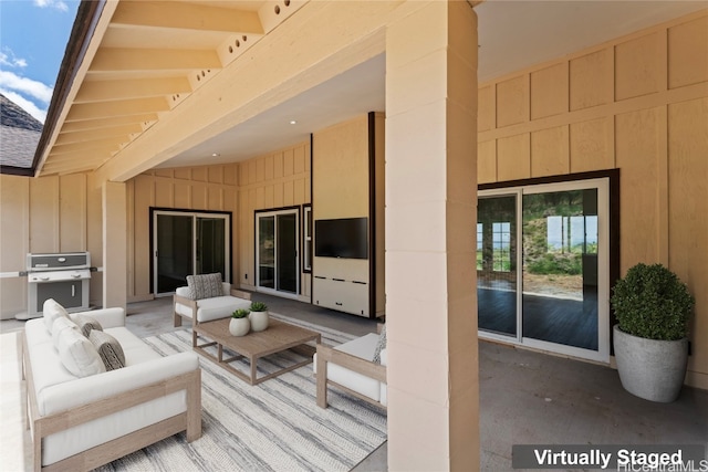 view of patio featuring area for grilling and an outdoor hangout area