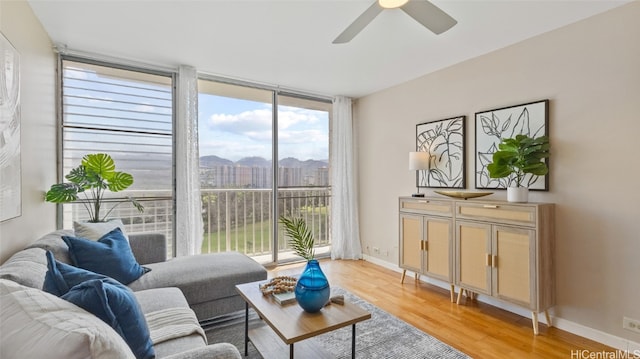 interior space with light hardwood / wood-style floors and ceiling fan