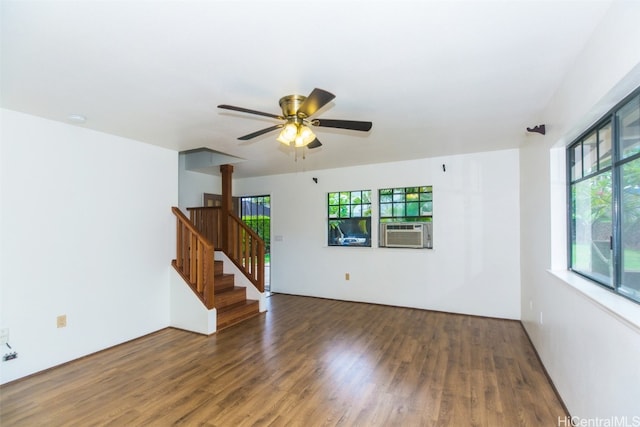 spare room with cooling unit, ceiling fan, and dark hardwood / wood-style flooring