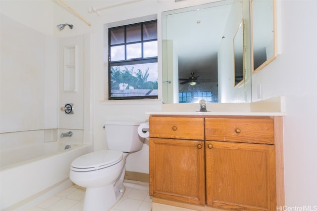 full bathroom featuring ceiling fan, toilet, vanity, washtub / shower combination, and tile patterned flooring