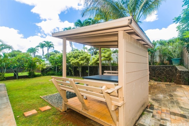 exterior space with a patio area and a yard