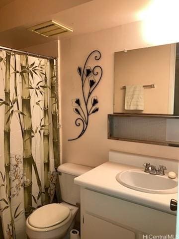 2572 Lemon Rd Unit 806, Honolulu, HI 96815 - full bath with visible vents, toilet, vanity, and a shower with shower curtain