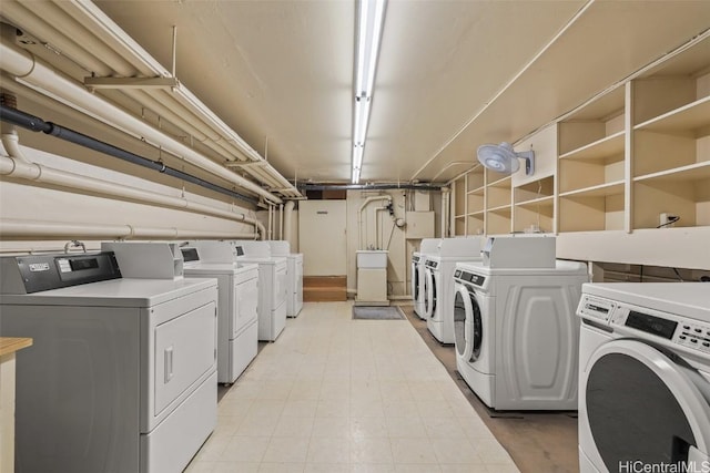 laundry room with washing machine and clothes dryer