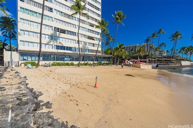 view of home's community featuring a view of the beach