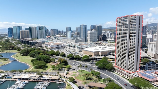 property's view of city with a water view